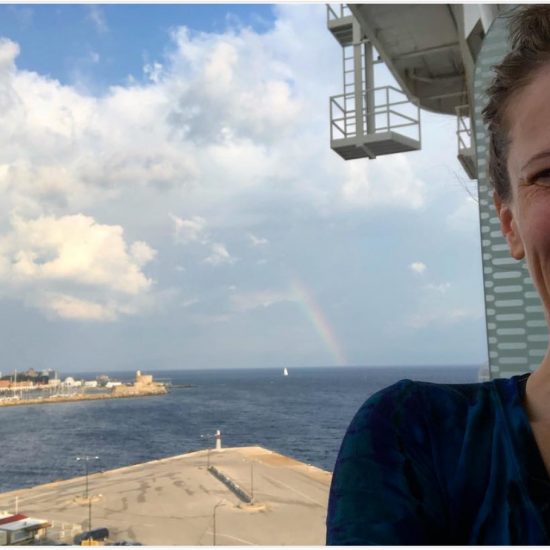 bonnie gillespie on balcony of cruise ship in rhodes greece